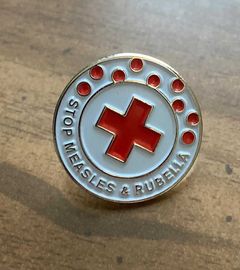 RCHS Red Cross Vaccinate a Village donation pin. 
