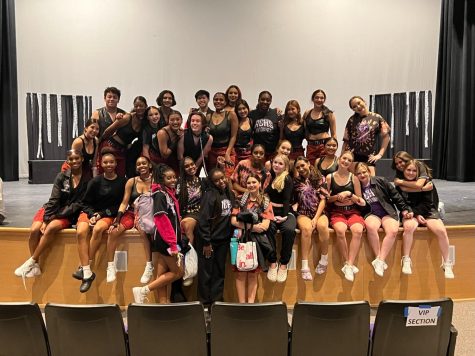 Varsity dances takes a group photo after district dance day concludes.
