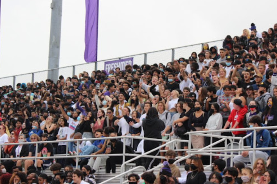 RCHS+students+cheer+from+the+students+section+during+the+2021+Homecoming+rally.++