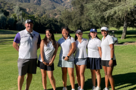 The Girls Golf team poses with Coach Rogers at their first match.
