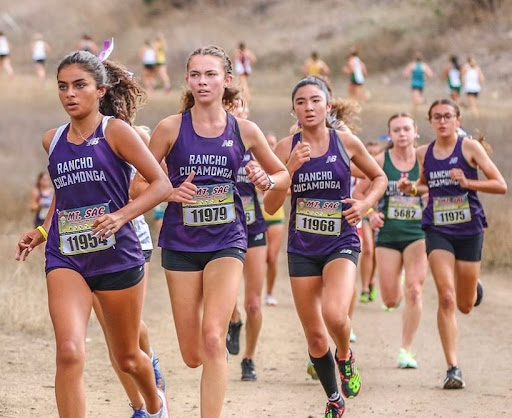 The Rancho Cucamonga girls cross country team races at Mount Mt. San Antonio College.