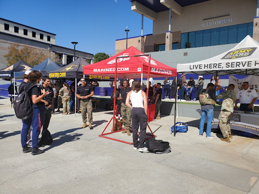 Students visit various booths on Monday, Oct. 17 during the college and career fair. 
