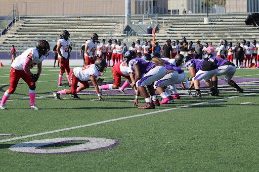Rancho’s JV defensive line gets ready pre-snap ready to snuff the Etiwanda offense.
