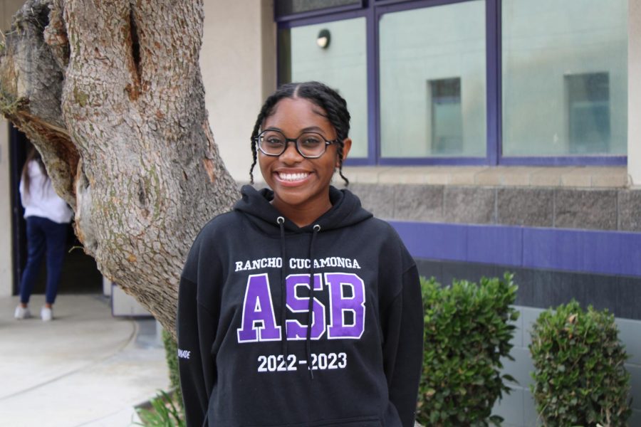 Gaelle Jean-Pierre poses outside while smiling and sporting her ASB sweatshirt.