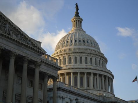 The Capitol building glistens in sunlight in Washington, D.C.