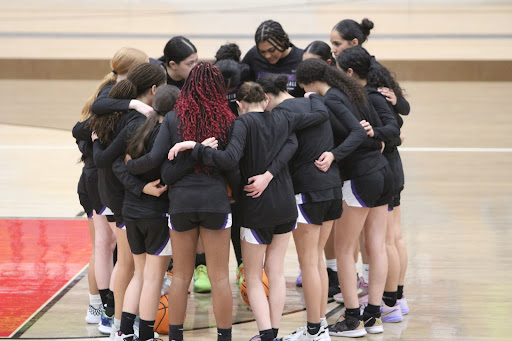 The RCHS girls basketball team huddled up before their match against Upland Highschool
