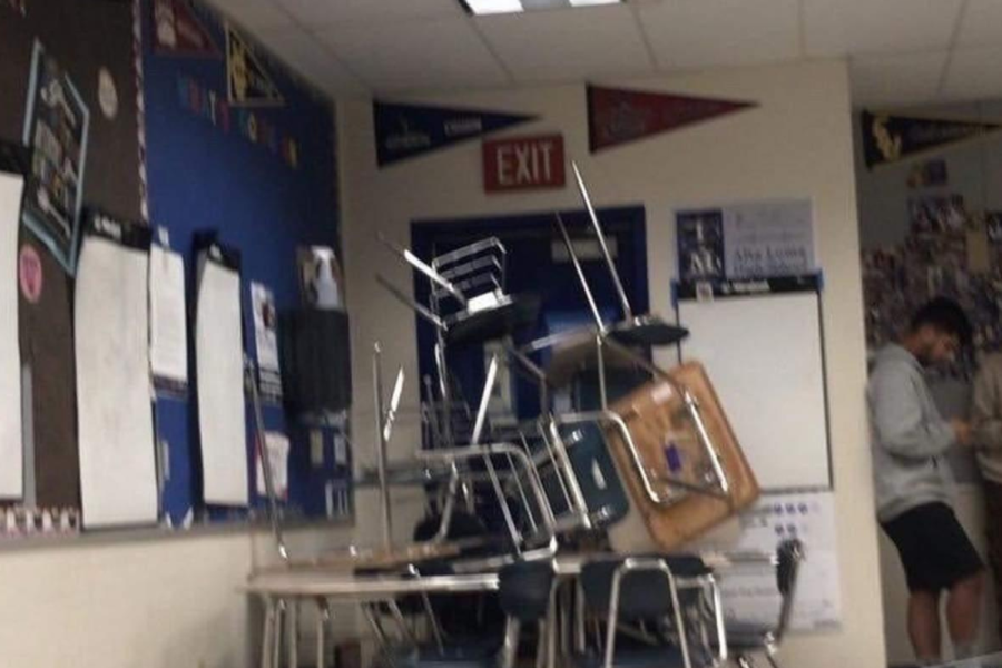 ALHS students barricade the classroom door with desks and chairs during the lockdown.