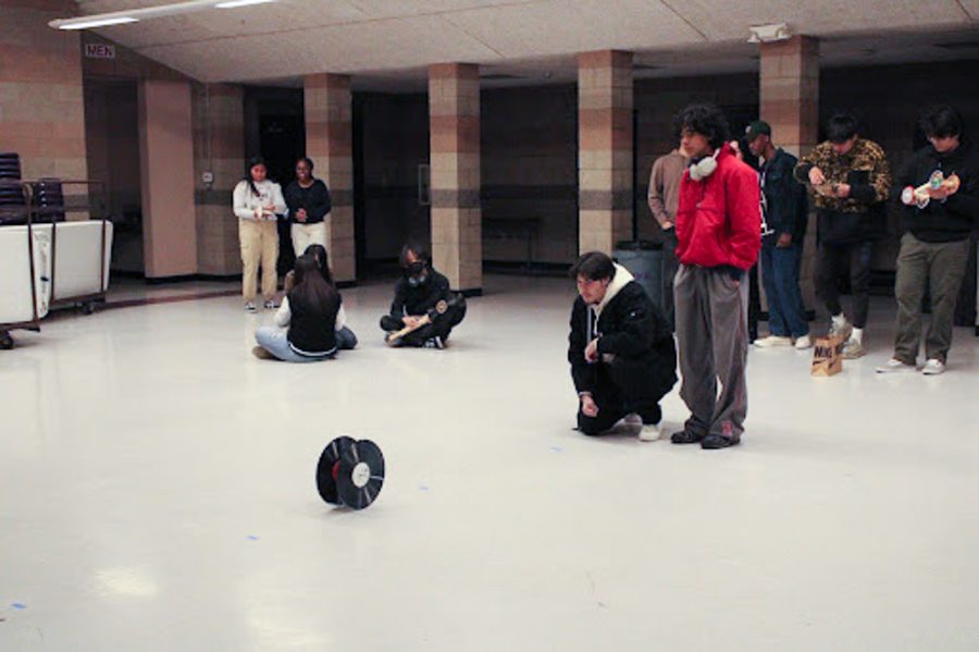 Juniors Matthew Lindensmith and Bodhi Beam test their mousetrap car in the MPR on Wednesday, Feb. 16.