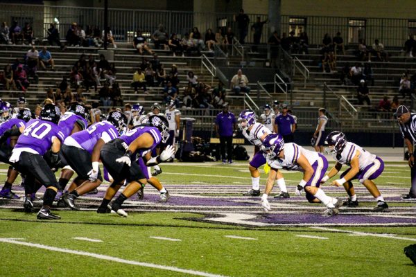 The RCHS Cougars lining up on offense against the Valencia Vikings