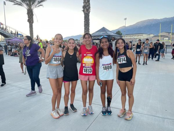 Several members of the girls cross country  team at all comers hosted by Rancho Cucamonga High School.