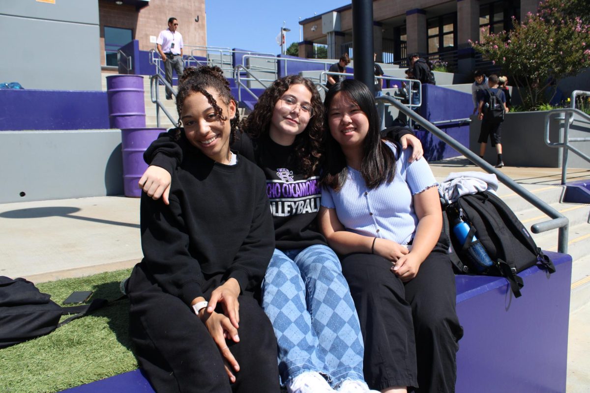  Demonstrating dress code standards, freshmen Lyricc Kelly, Juliet Law, and Jocelyn Tang pose for a picture in the quad.

