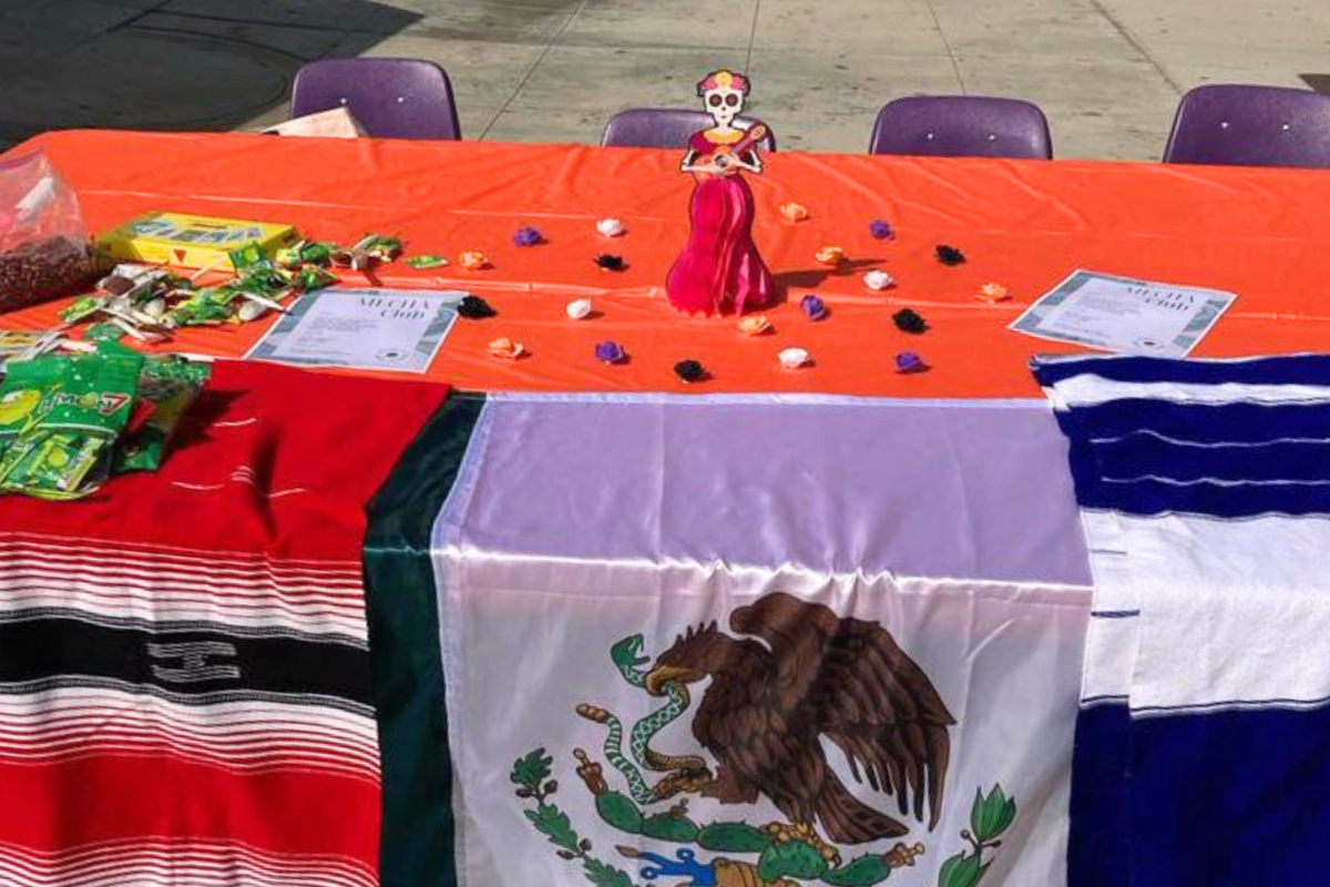  Table with different hispanic flags at rchs Mecha club event