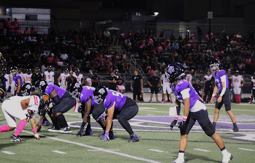 The RCHS Cougars line up on offense against the Etiwanda Eagles during their home pink-out game on Oct. 6, 2023.
