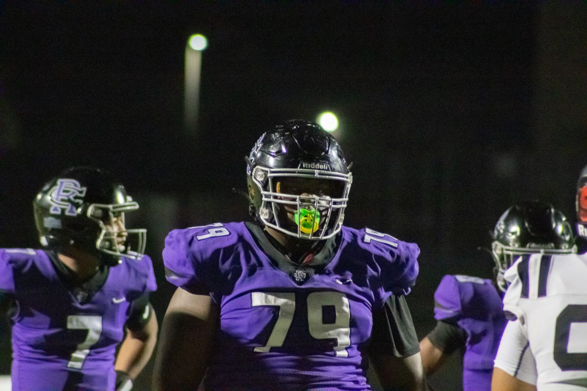 Senior Derrick Cooper prepares for an attempt at a touchdown.