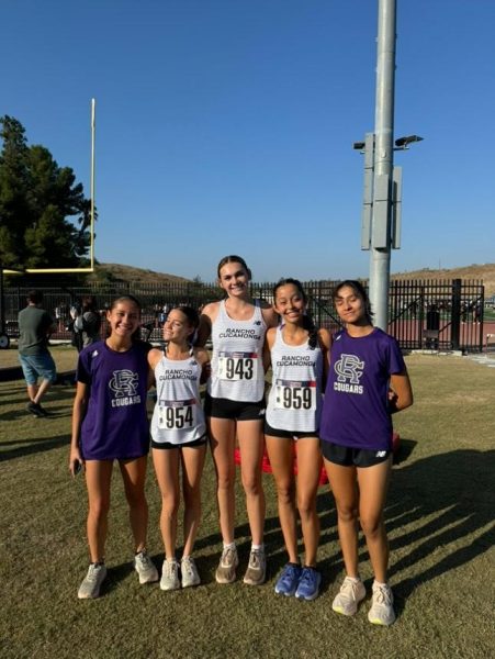 Varsity runners seniors Kaitlyn Montes, Hannah Butterfield, and Braelyn Keisher pose for a picture after a meet. Photo courtesy: Hannah Butterfiled