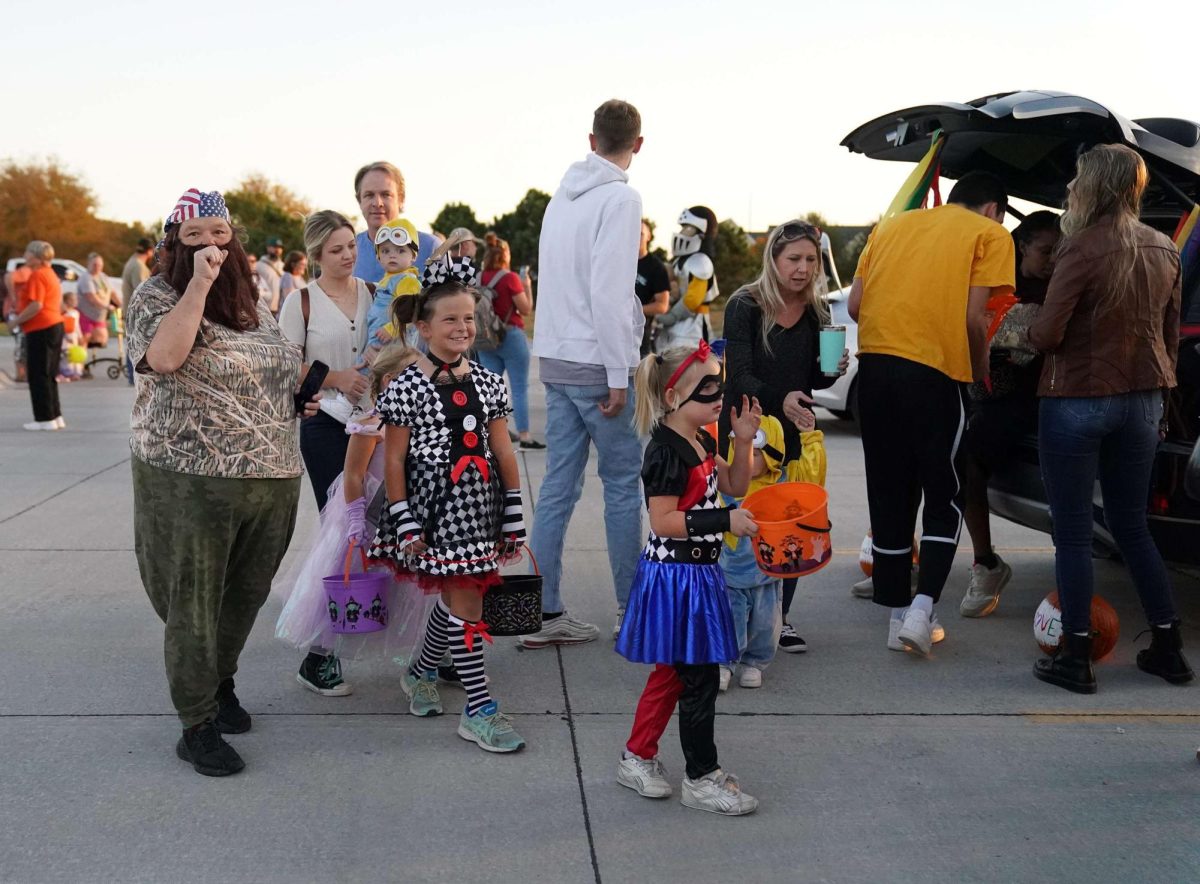 Many people come together to celebrate trunk-or-treating. (Photo used with permission and courtesy of Great Bend Post).