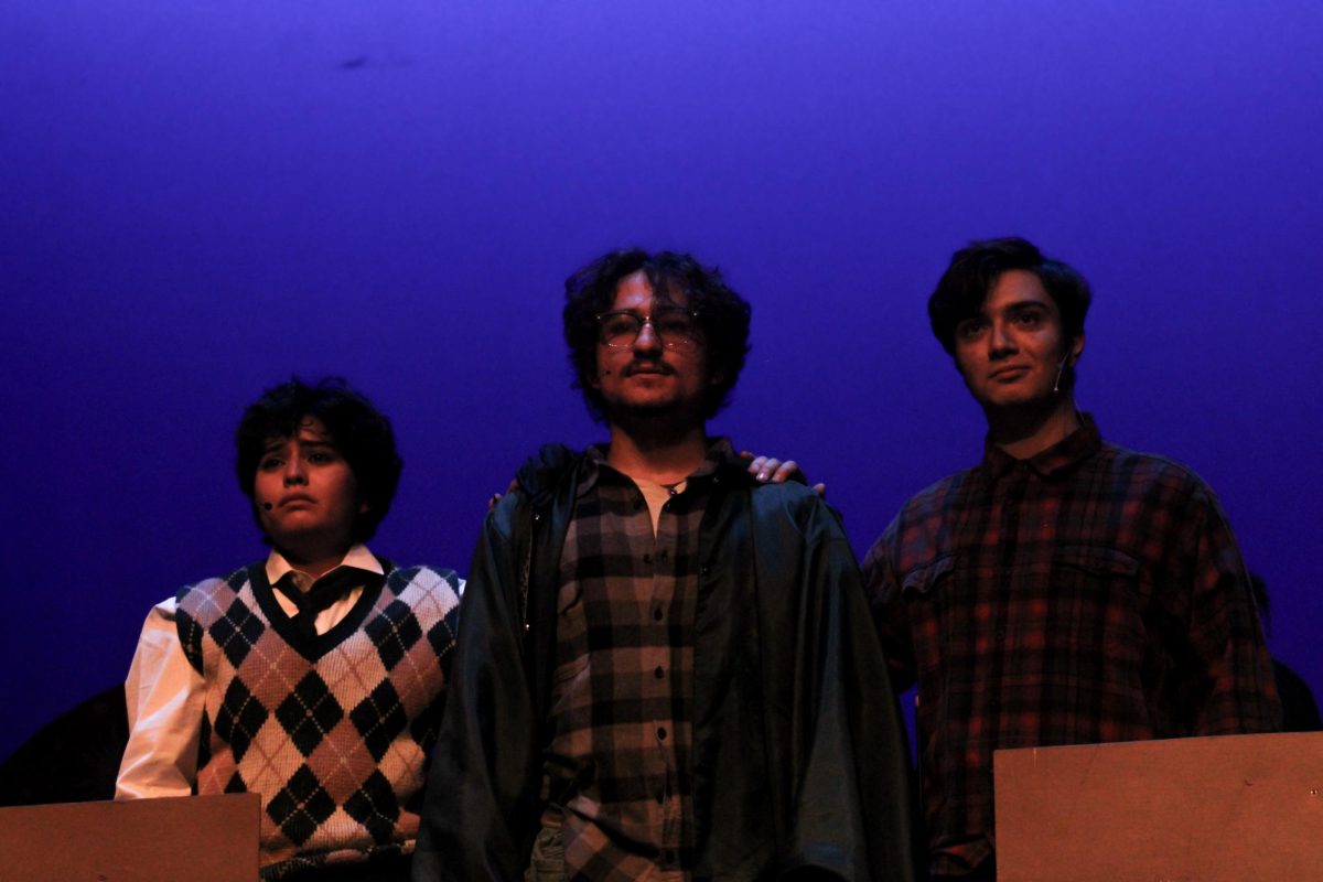 Portraying the roles Albus Severus Potter, Harry Potter, and Ron Weasley- Seniors Sophia Garcia Lopez and Matthew Becerra and Junior Arsham Sobbi stand together as they watch the death of the Potter family. 