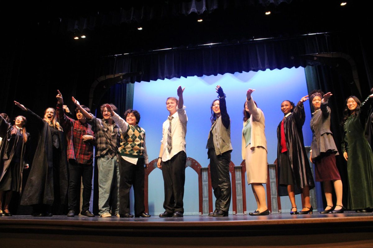 The Gryffindor cast bows to the crowd at the end of the show and engages with the audience. 