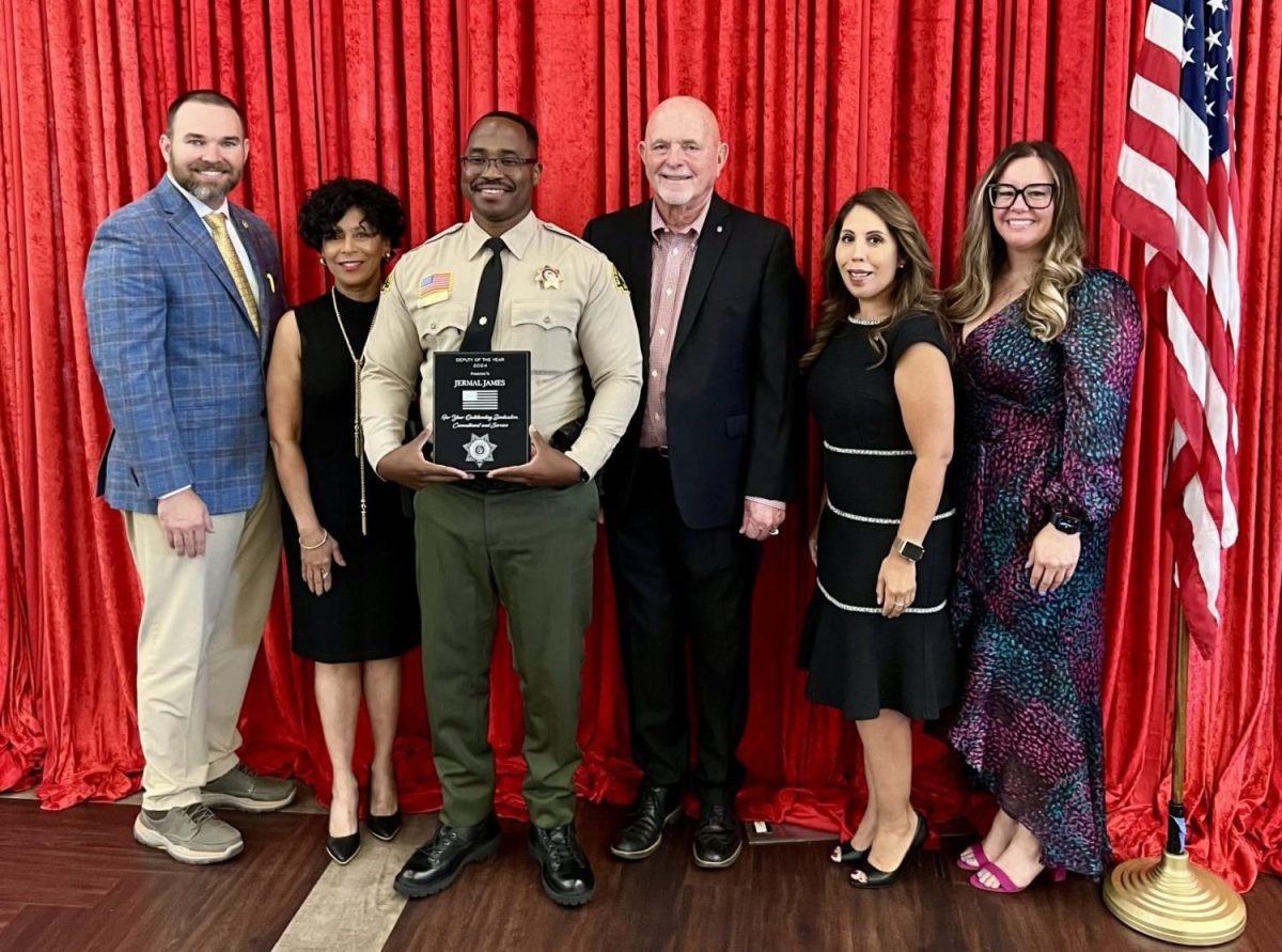 Deputy James holding his plaque that was awarded to him by the Rancho Cucamonga Police Department at the ceremony. 

Credit to the RCPD.