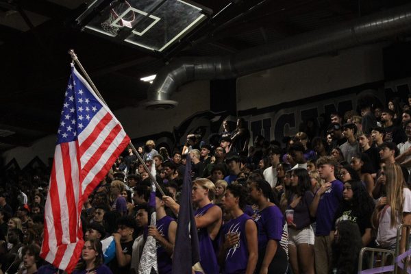 Students gather the gym for the 2024 - 2025 Homecoming rally, displaying school spirit.