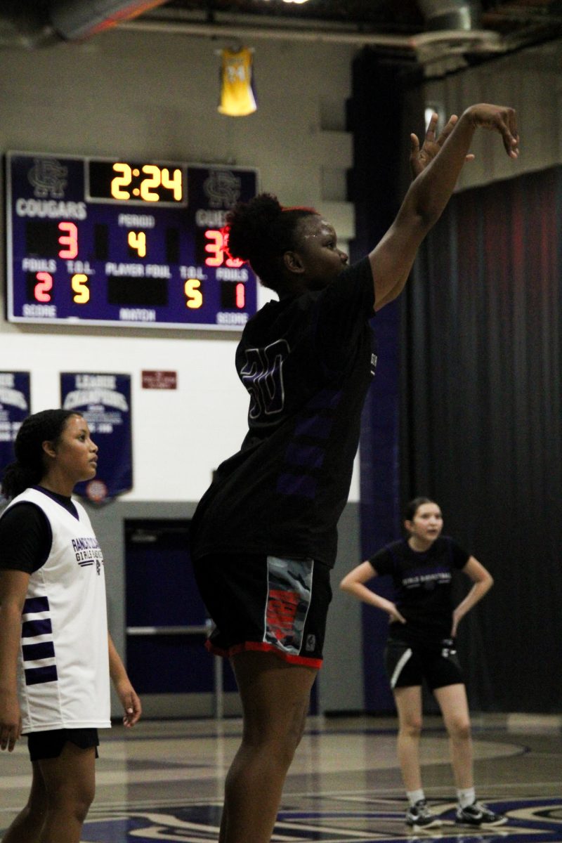 Sophomore Zara Ahaiwe takes a jump shot at RCHS practice.