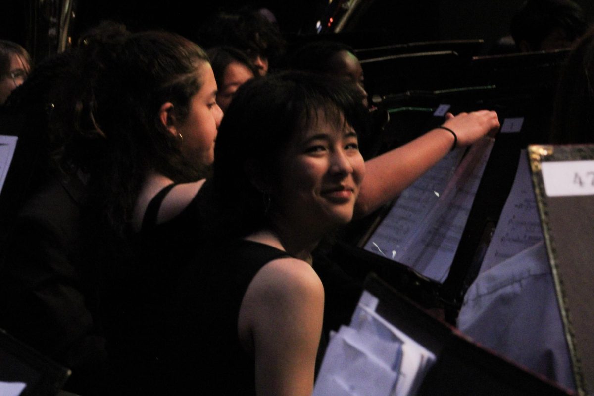 Junior Chloe Liu smiles for the camera before her final performance.