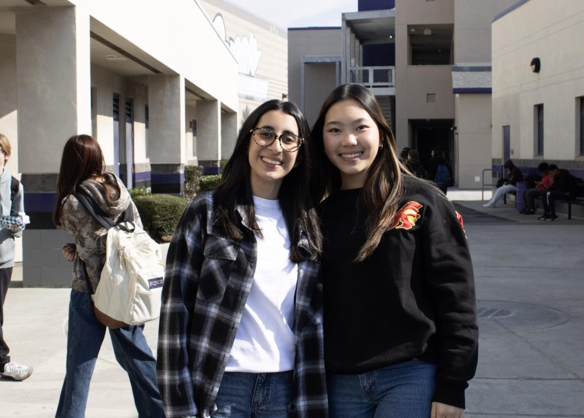 For Tuesday's Kindness Week, Freshman Sanabel Suleiman and Junior Alessea Pai, "stick to the status quo" , dress as a clique