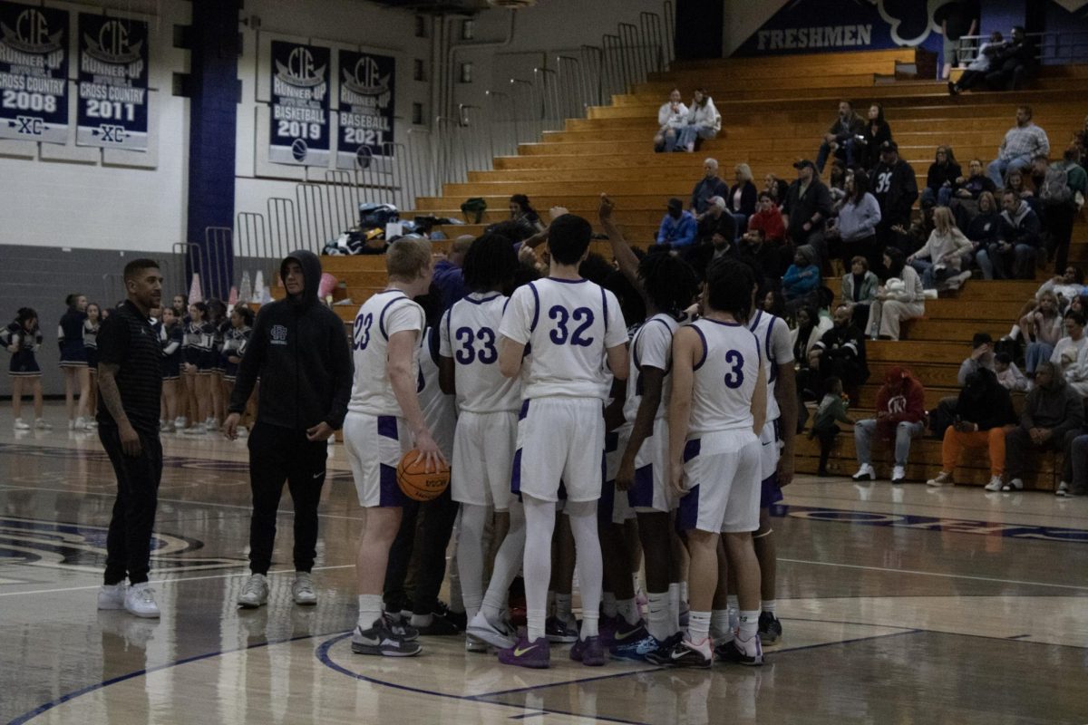 The RCHS varsity basketball team huddles before its game against Los Osos on Friday, Jan. 31. 