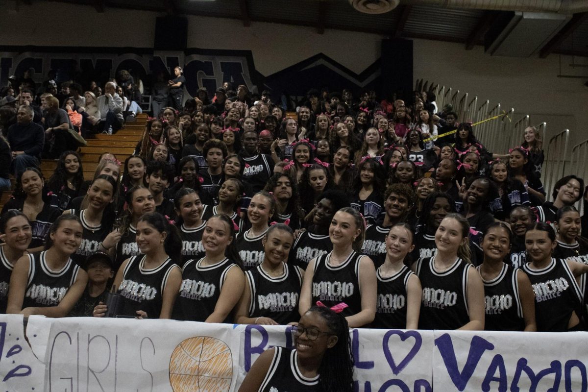 The RCHS varsity, JV, and dance three teams pose for a picture at the.varsity boys basketball game against Los Osos on Friday, Jan. 31. 