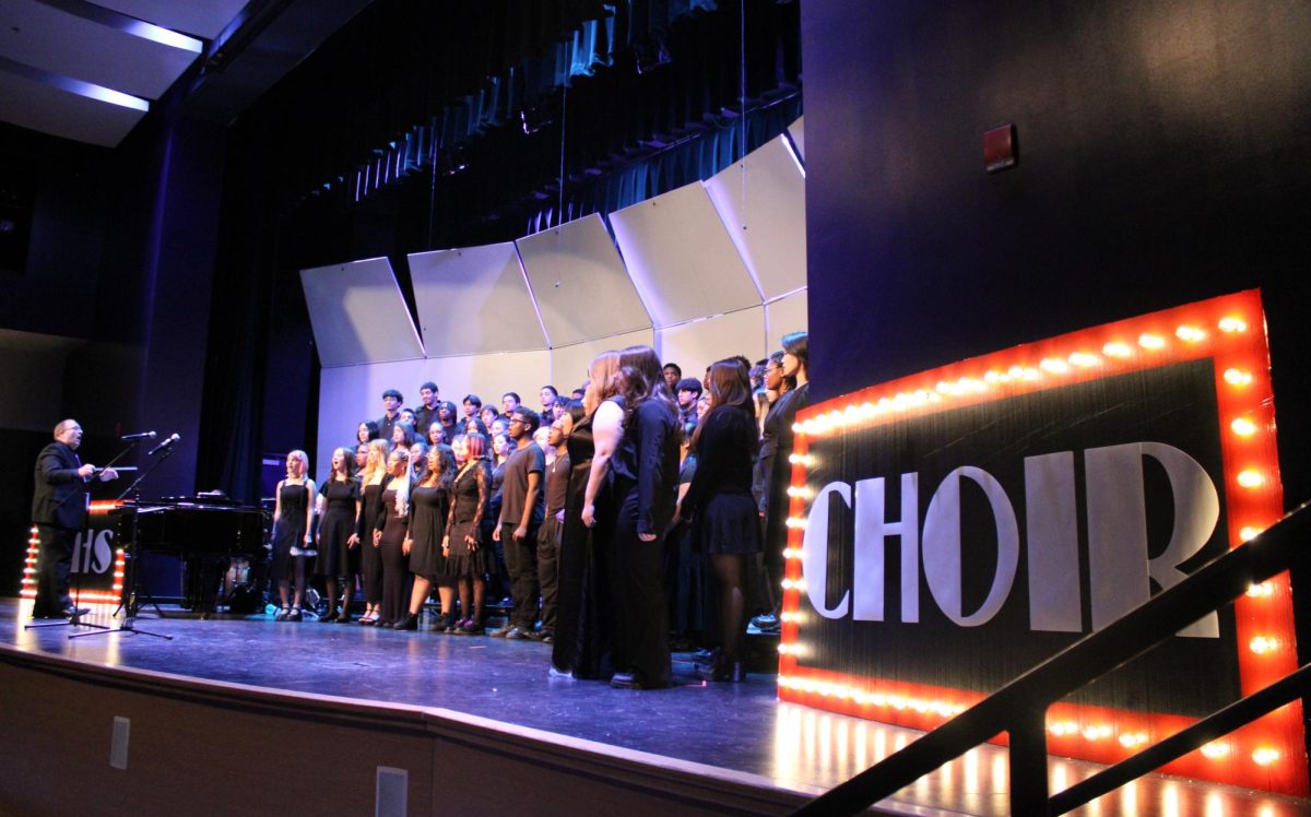 "Chambers Choir delivers an electrifying performance of You Can't Stop the Beat from Hairspray, 