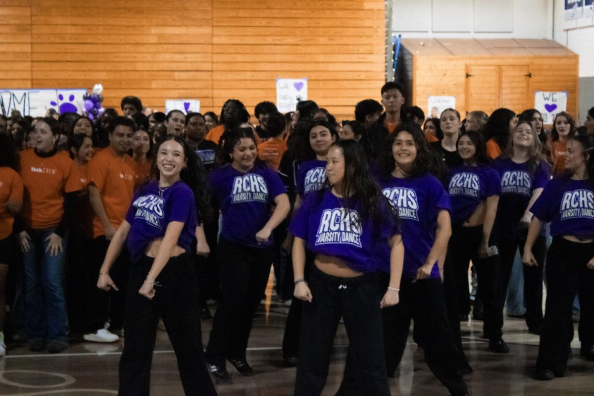 Varsity dance dancing to "We're all in this Together" from the High School Musical Movie