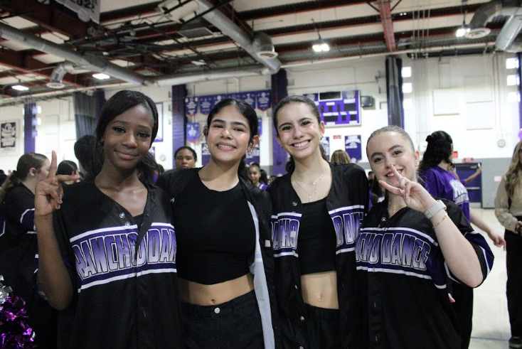 JV dance students (from left to right) Melodee Hall, Arianna Quinonez, Avery Naranjo, and Julia Wentzell get ready for their performance.