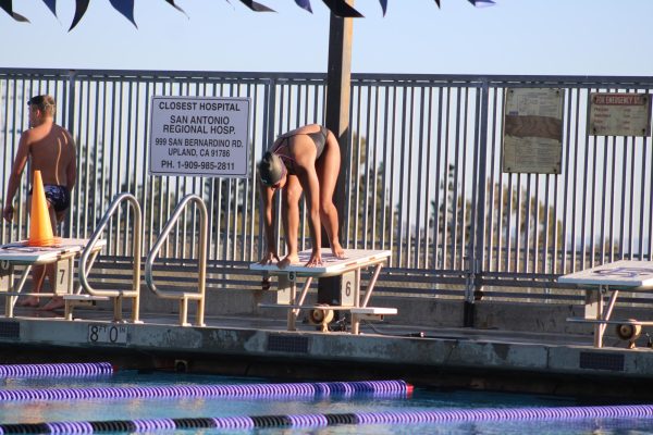 Girls Varsity take their mark before they start the event