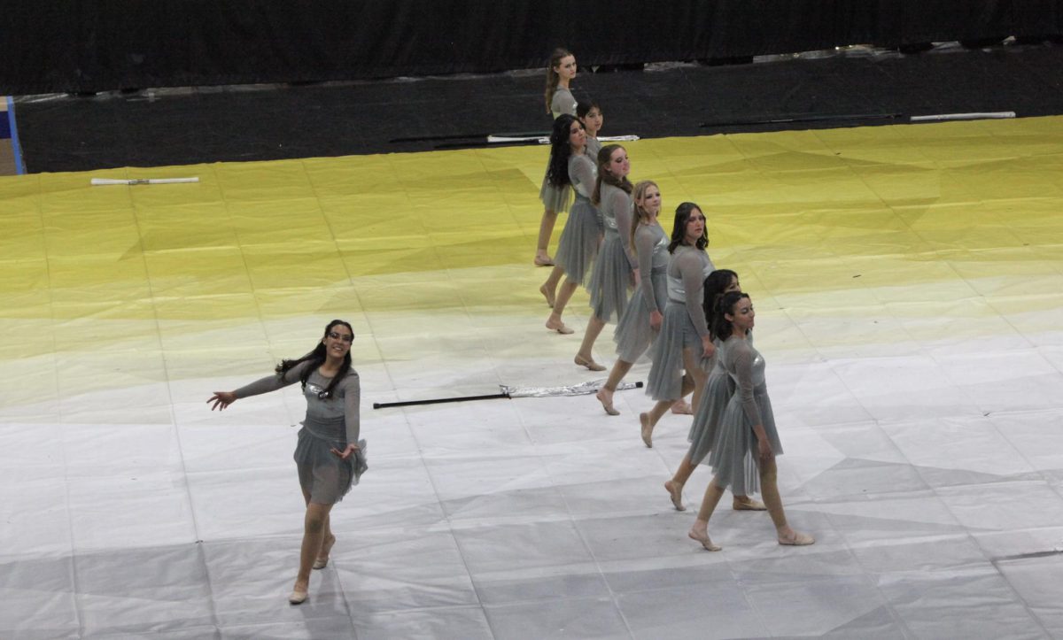 JV Color Guard in the beginning of their performance, "Colorblind".