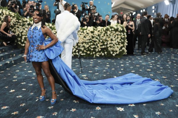 Simone Biles poses during the Met Gala, an annual fundraising gala held for the benefit of the Metropolitan Museum of Art's Costume Institute with this year's theme 'Superfine: Tailoring Black Style,' in New York City, New York, U.S., May 5, 2025. REUTERS/Mario Anzuoni