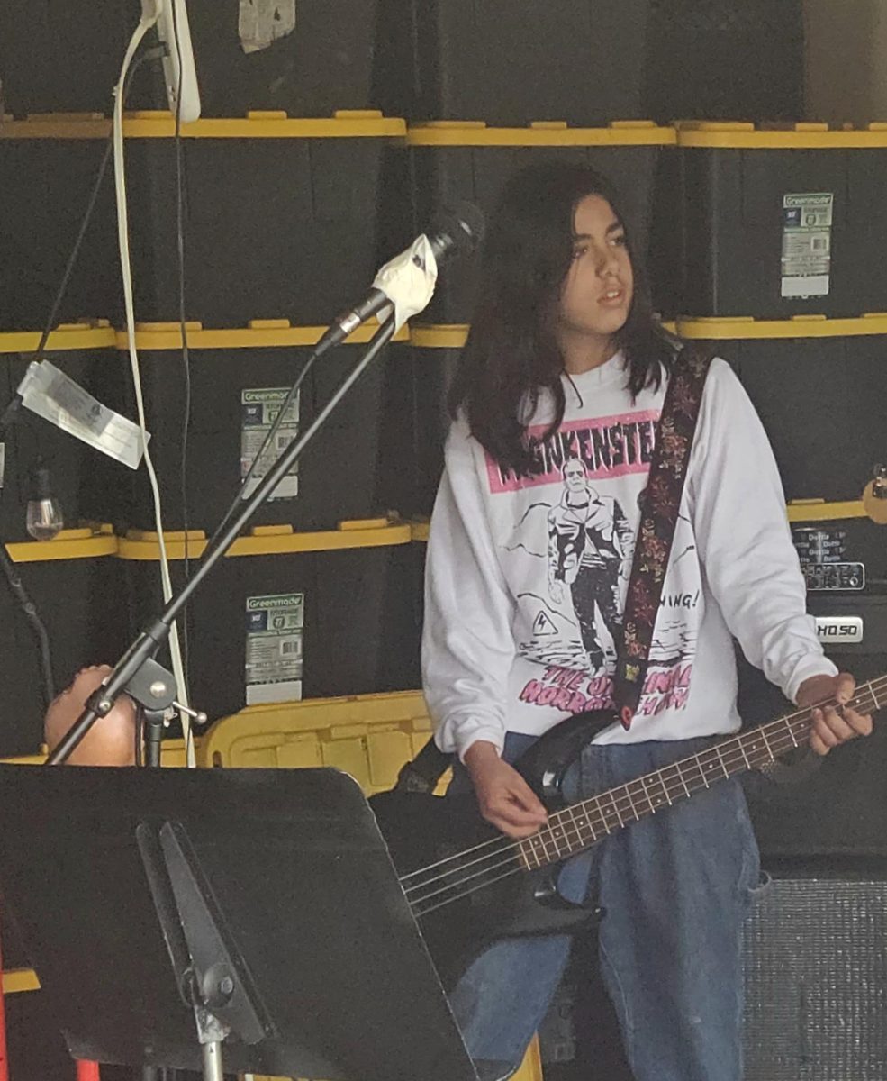 Bassist Roscin Stevenson keeps a beat with the bass. 