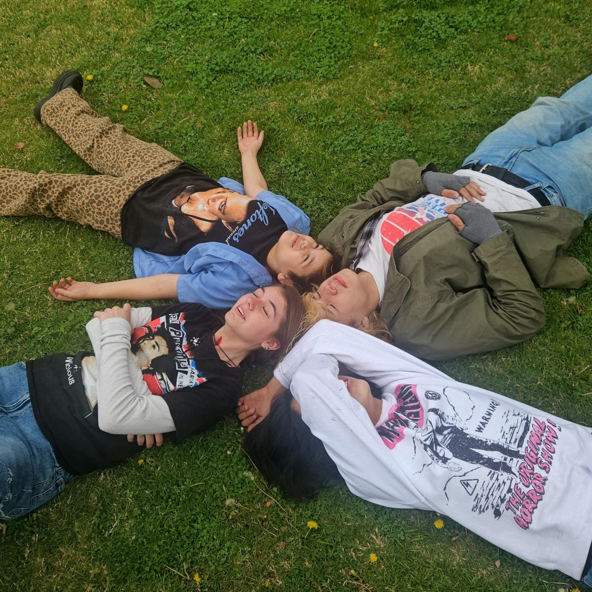 Members of the band Hunky Dori pose for a picture.