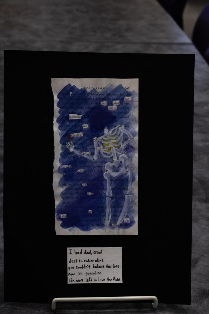 A skeleton covering the page under the blue sky.
