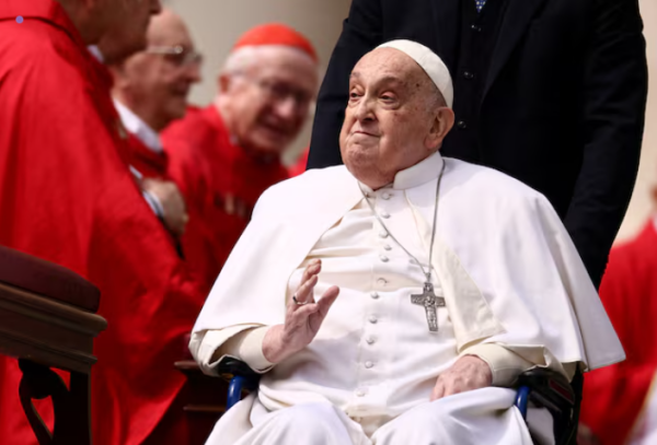 Pope Francis sitting at Sunday palm at Saint Peter's Square 