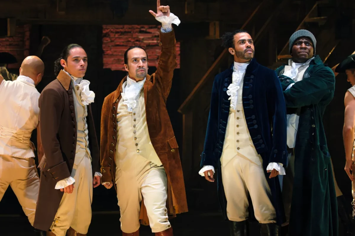 Anthony Ramos is John Laurens, Lin-Manuel Miranda is Alexander Hamilton, Daveed Diggs is the Marquis de Lafayette, and Okieriete Onaodowan is Hercules Mulligan in filmed version of 'HAMILTON'. Photo courtesy: Disney