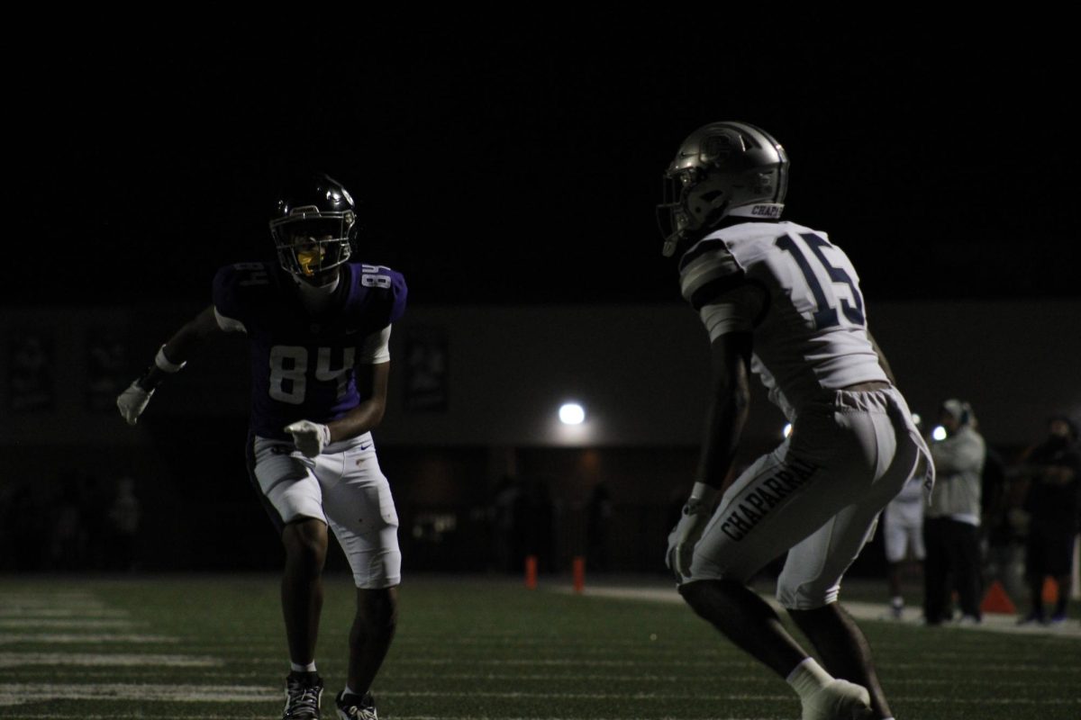 RCHS junior Dillion Sykes takes off from the line of scrimmage to get open against Chaparral High School.