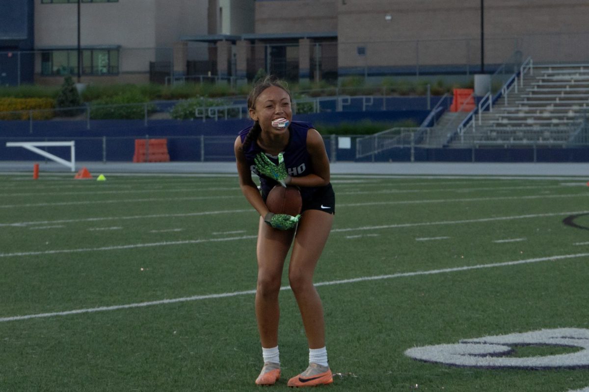 RCHS Senior Antionette Green reacts in shock after getting an interception against Santiago High School.