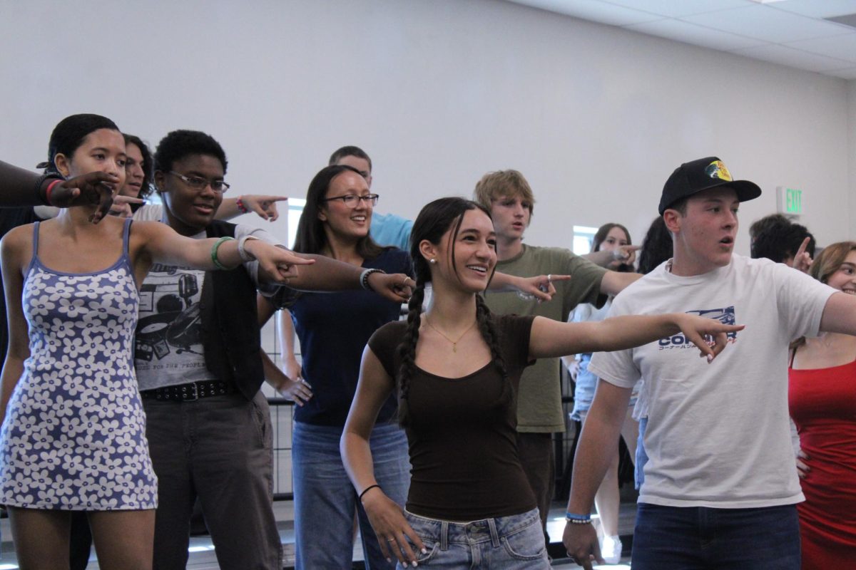Choir practices their choreography for their upcoming performance.
