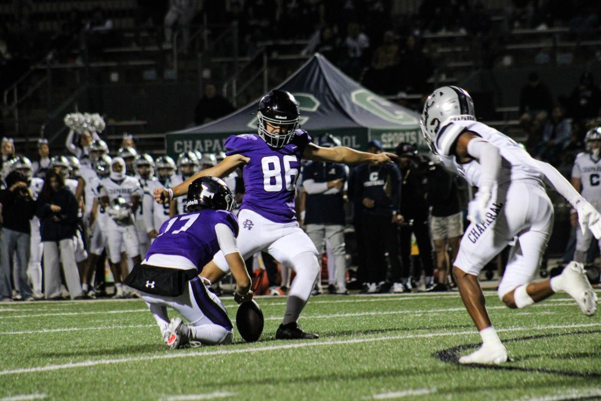 Senior Romano Annecchini kicks a field goal againt Chaparral High School