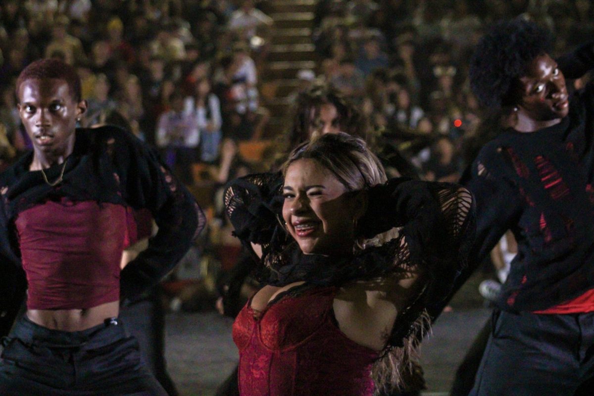 Varsity dancer, junior Arely Hernandez, performs with varsity dance at the homecoming rally