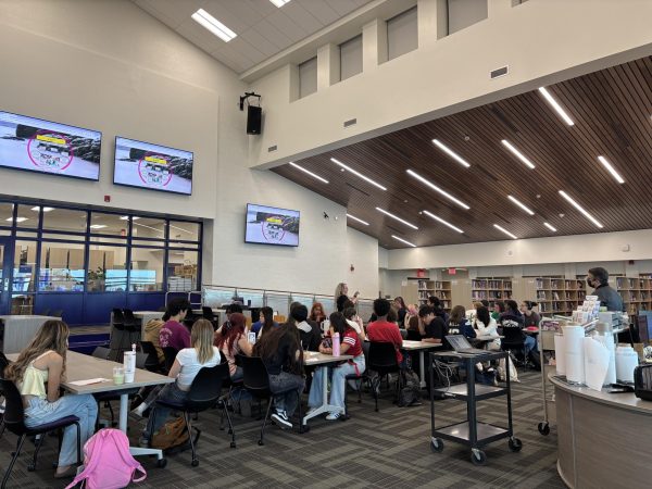 A class of students visit the library on its opening day on Thursday, Sept. 4 to hear about college and career readiness. 
