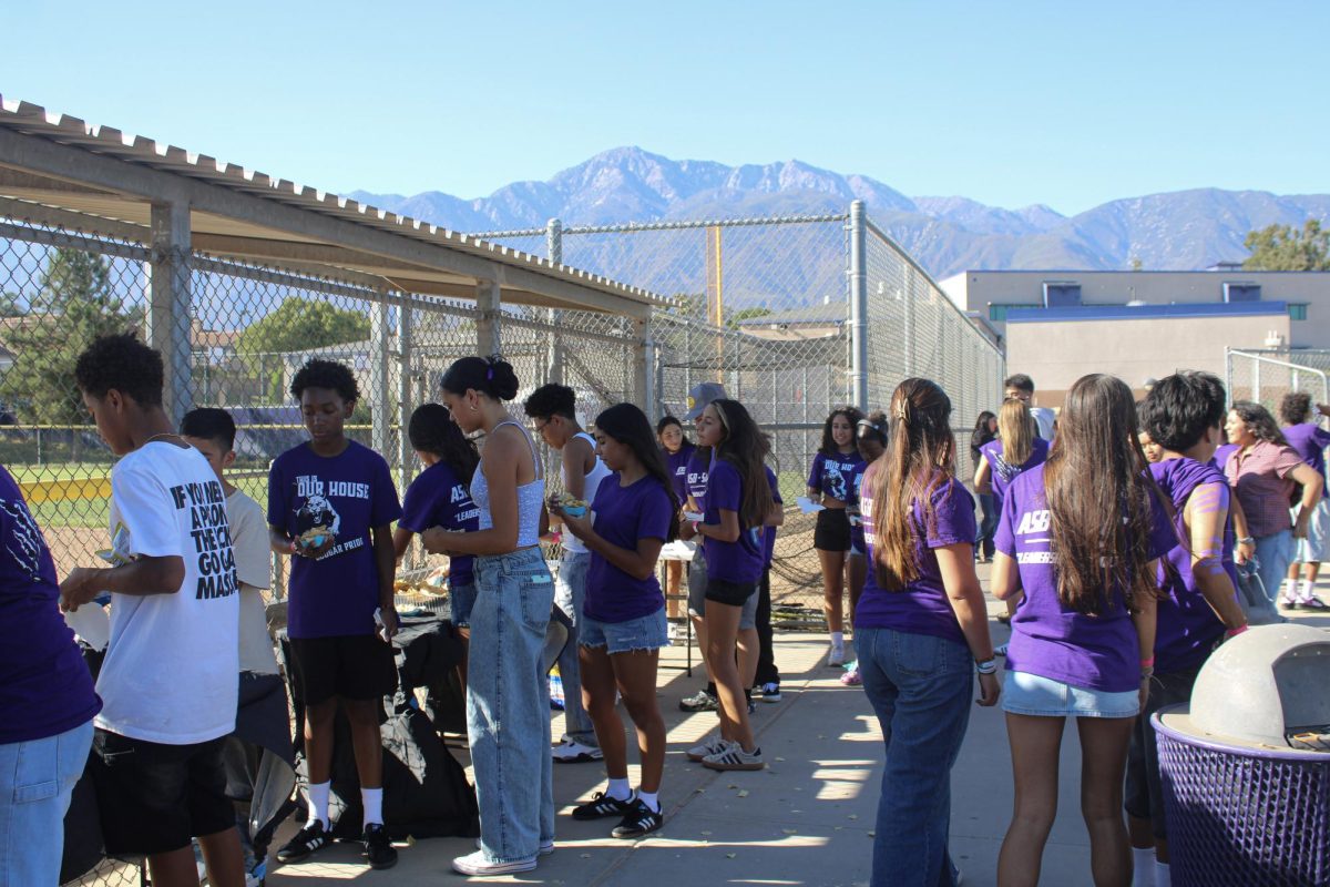 Freshmen stand in line to receive refreshments at this year's freshman tailgate.