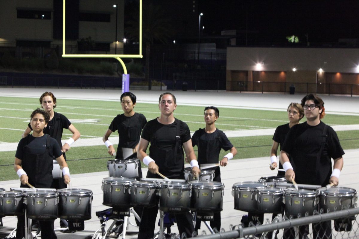 Quads and toms play during their music demonstration for the audience.