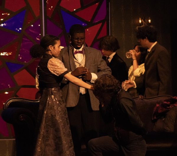 Senior Khloe Wales and junior Dawson Hyde portray their characters Lucy and Dracula on stage during the play.