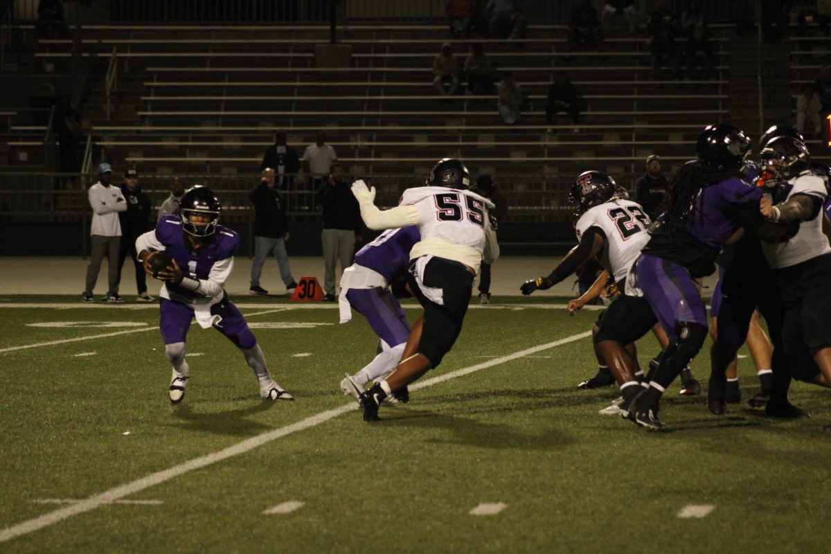  Senior Jacob Chambers fakes a run play in the first round of CIF playoffs.